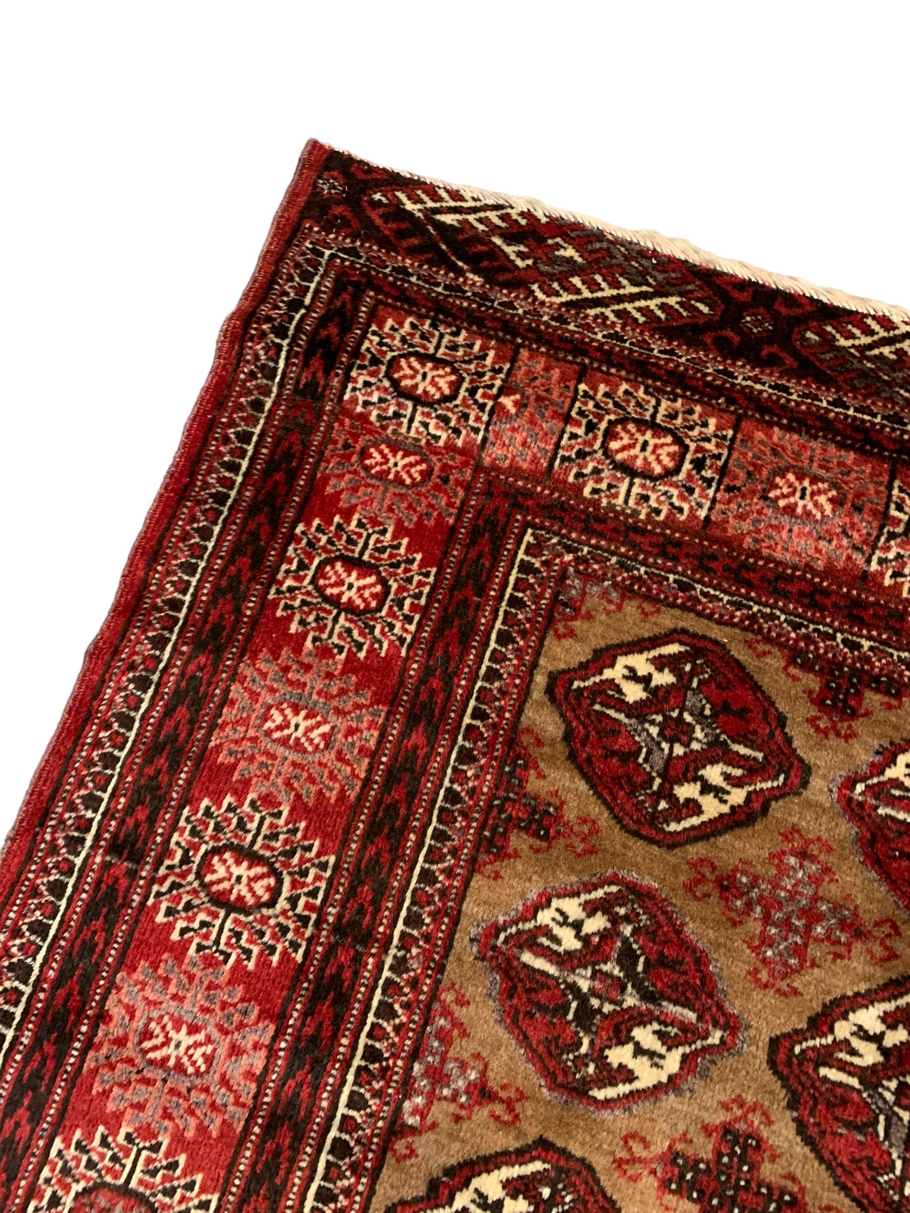 Persian Bokhara red ground rug - Image 3 of 6
