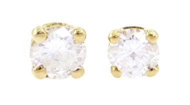 Pair of 18ct gold round brilliant cut diamond stud earrings