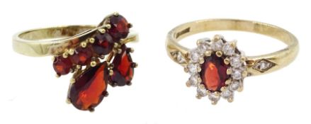 8ct gold garnet ring and a 9ct gold garnet and cubic zirconia cluster ring