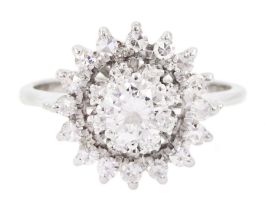 Platinum round brilliant cut diamond cluster ring