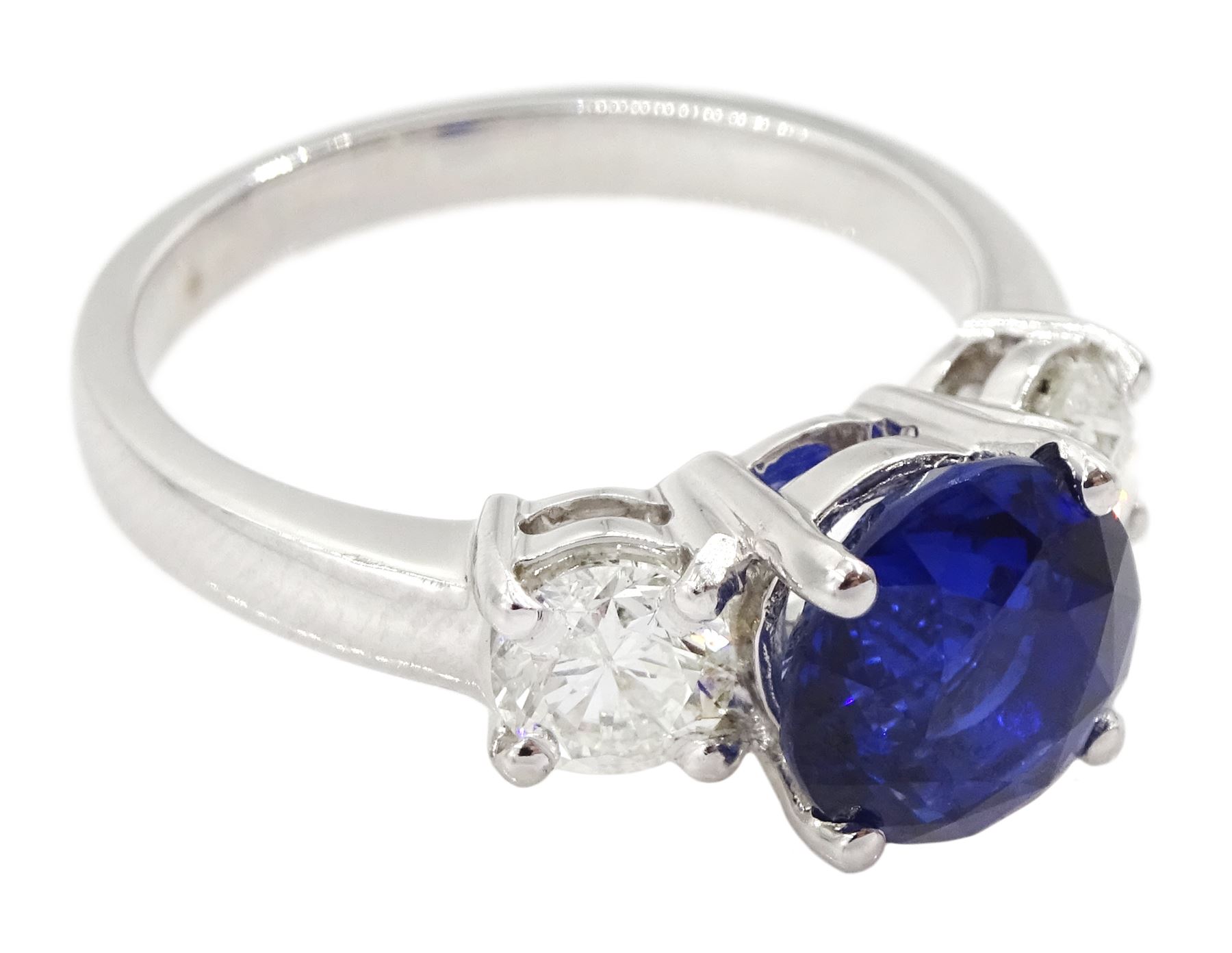 18ct white gold three stone fine sapphire and round brilliant cut ...