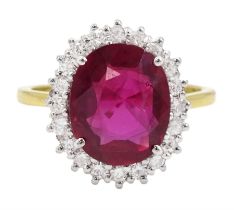 18ct gold oval cut Thai ruby and round brilliant cut diamond cluster ring