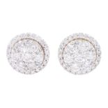 Pair of gold round brilliant cut diamond cluster stud earrings