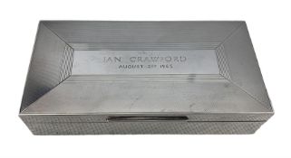 Silver rectangular cigarette box with engine turned hinged cover with inscription W18cm Circa 1965 M