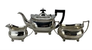 Silver rectangular teapot with ebonised handle and lift on ball feet Birmingham 1929 Maker Bros. sim