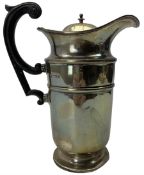 Silver hot water jug with stained wooden handle and circular foot H20cm Birmingham 1910 Maker Stewar