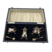 Silver three piece condiment set with cyma edge decoration Birmingham 1973