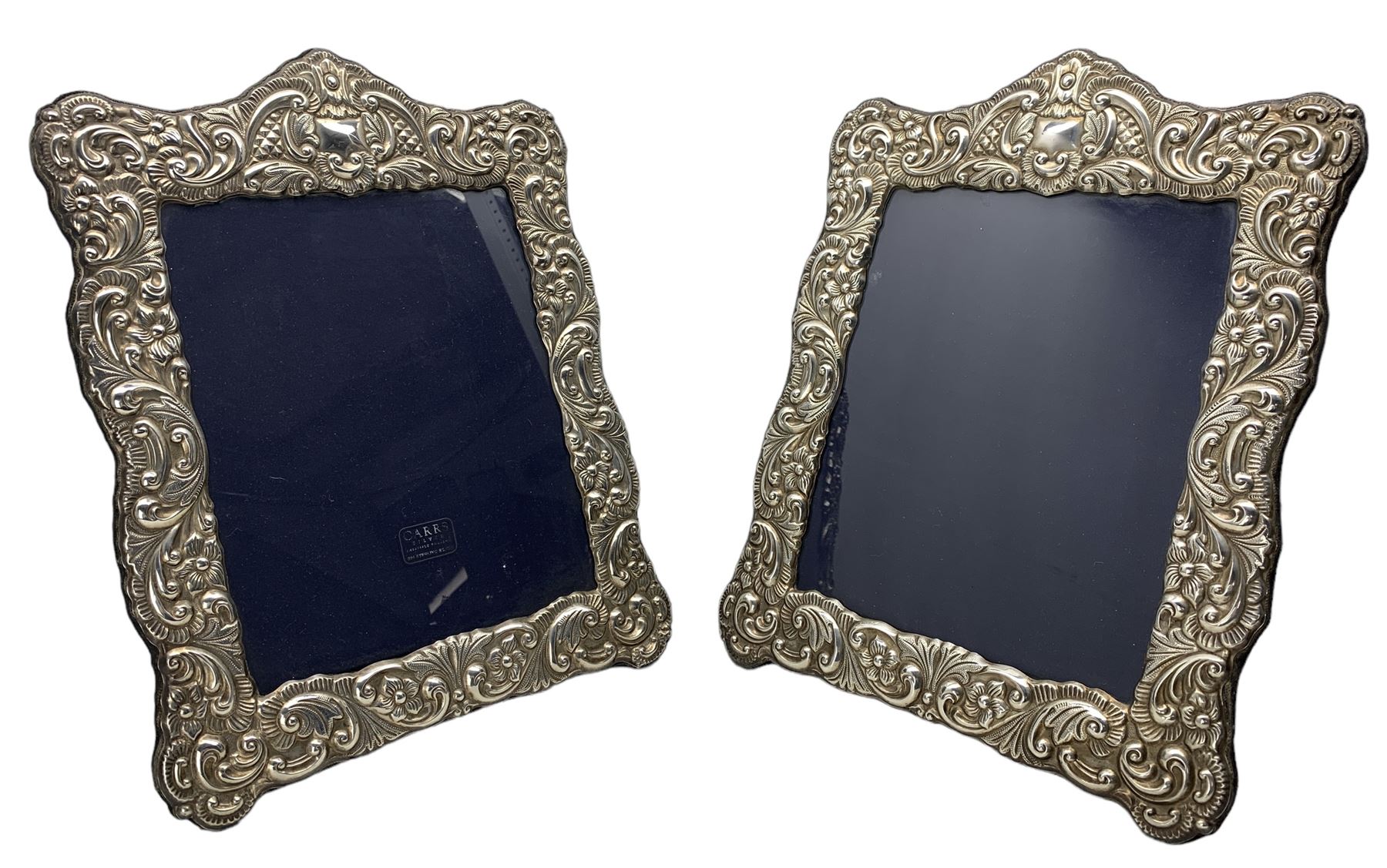 Pair of silver photograph frames with floral embossed decoration aperture size 25cm x 20cm Sheffield