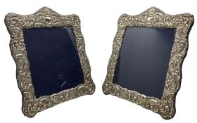 Pair of silver photograph frames with floral embossed decoration aperture size 25cm x 20cm Sheffield