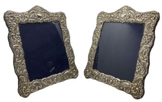 Pair of silver photograph frames with floral embossed decoration aperture size 25cm x 20cm Sheffield