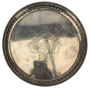 Victorian silver circular salver with beaded border and engraved with a coat of arms on paw feet D25