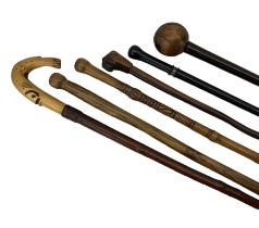 Group of vintage walking hardwood walking sticks & Knobkerrie