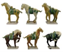 Group of six Chinese Tang style pottery horses