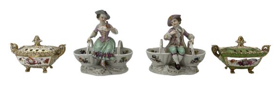 Pair of German porcleian salts in the form of a boy and girl