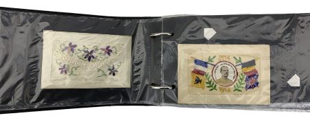 Ring binder and contents of WWI silks including 1914-1915 card with portrait of Lord Kitchener