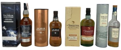 Four bottles of single malt scotch whisky comprising Talisker Dark Storm