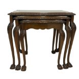 Mid-20th century nest of three walnut occasional tables