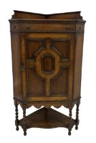 Early 20th century oak corner cupboard