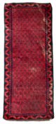 Persian Baluchi crimson ground runner rug