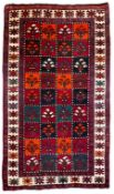 Persian Shiraz crimson ground garden rug