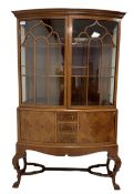 Early 20th century inlaid walnut bow-front display cabinet