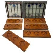 Four leaded and stained glass window panels