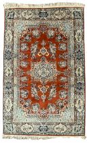 Persian Kerman red ground rug