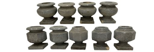 Nine granite finish urn form planters