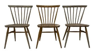 Ercol - 1960s set of three elm stick back chairs
