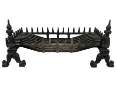 Large cast iron fire basket with fire dogs or andirons