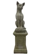 Cast stone garden figure of a seated cat on square pedestal