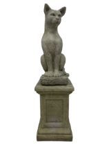 Cast stone garden figure of a seated cat on square pedestal