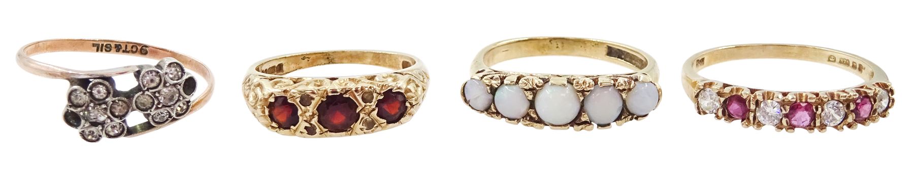 Three 9ct gold rings including garnet