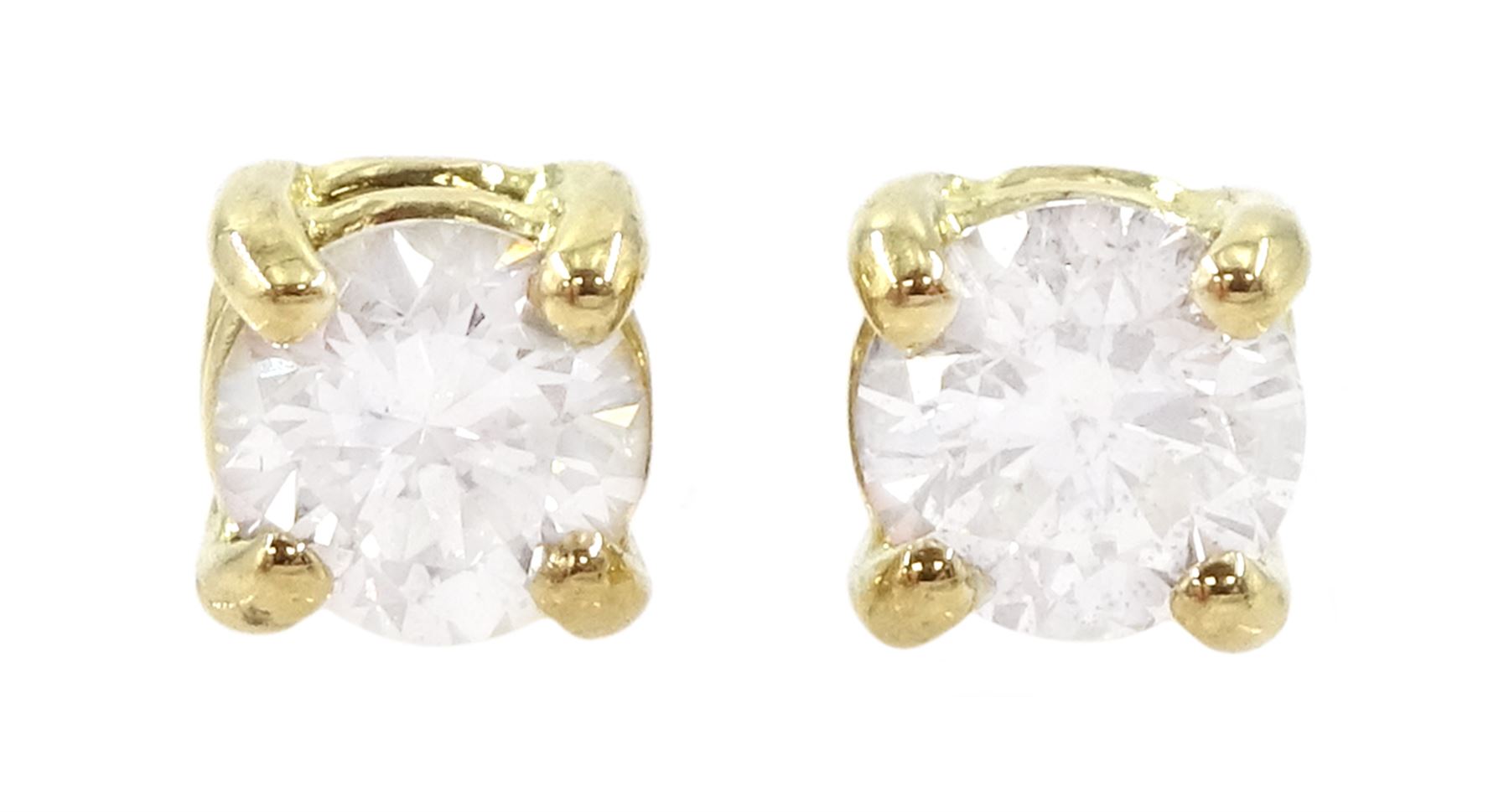 Pair of 18ct gold round brilliant cut diamond stud earrings