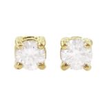 Pair of 18ct gold round brilliant cut diamond stud earrings