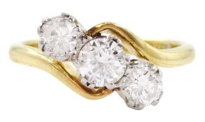 18ct gold three stone round brilliant cut diamond crossover ring
