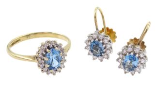 9ct gold oval cut blue topaz and round brilliant cut diamond cluster ring and a pair of similar 9ct