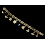 Swiss 18ct gold charm bracelet by Brofod Aktiebolaget