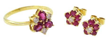 Gold oval cut ruby and round brilliant cut diamond cluster ring