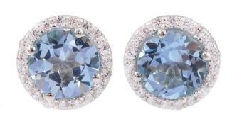 Pair of silver blue topaz stud earrings