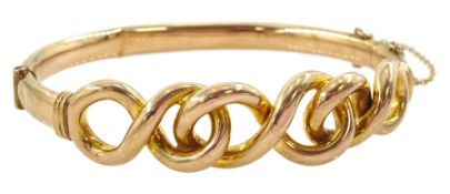 Early 20th century 9ct rose gold infinity link hinged bangle