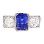 Platinum milgrain set three stone octagonal cut sapphire and old cut diamond ring