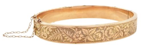 Early 20th century rose gold foliate engraved hinged bangle