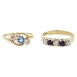 Gold three stone blue topaz and diamond ring and a gold four stone sapphire and cubic zirconia ring