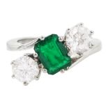 18ct white gold three stone octagonal cut emerald and round cut diamond crossover ring