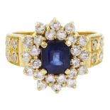 18ct gold octagonal cut sapphire and round brilliant cut diamond cluster ring