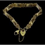 9ct gold four bar fancy gate link bracelet with heart locket clasp