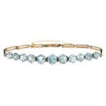 Early 20th century gold graduating round cut blue zircon bracelet