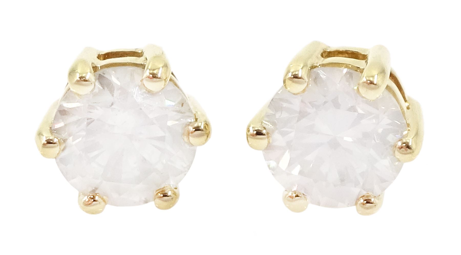 Pair of 18ct gold round brilliant cut diamond stud earrings