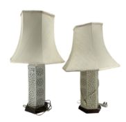 Near pair of modern pierced pottery electric table lamps and shades